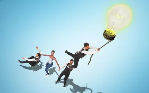 Concept of a successful team idea A light bulb that pulls people up 3d render Stock Illustration