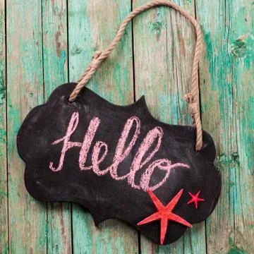 Concept of the summer time with fish star ,sea shells and chalkboard Stock Photos