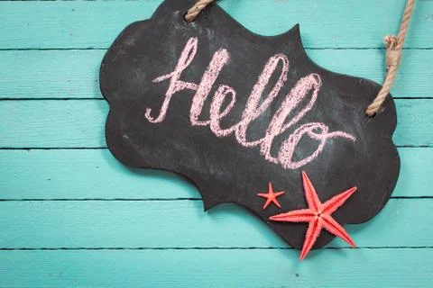 Concept of the summer time with fish star ,sea shells and chalkboard Stock Photos