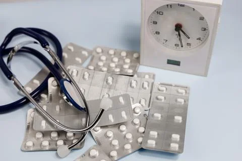 Concept of taking pills on time Stock Photos