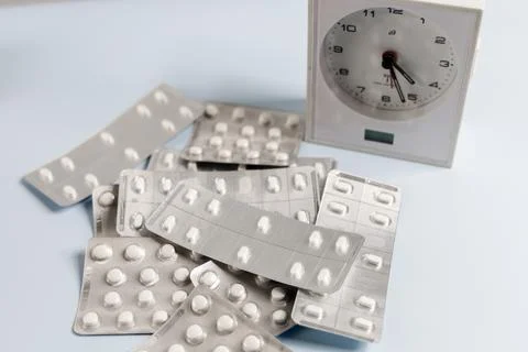 Concept of taking pills on time Stock Photos