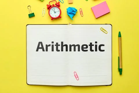 Concept of teaching program in arithmetic in notebook with top view Stock Photos