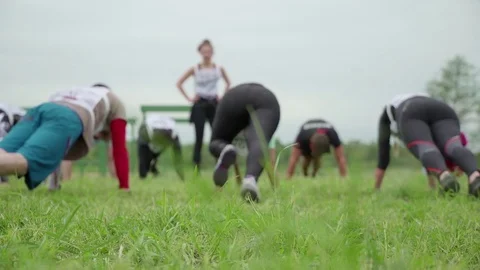 Concept team building group of young people guys and girls men and women doing Stock Footage 84994240