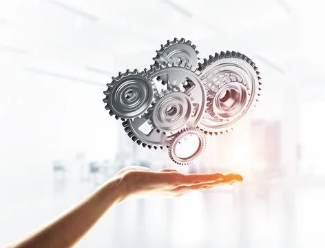 Concept of teamwork and cooperation presented with working gear engine Stock Photos