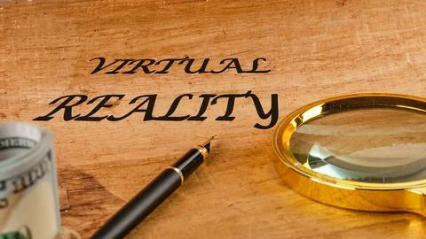 The concept of technology and development. Phrase, words, text VIRTUAL REAL.. 写真素材