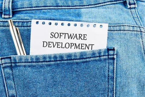 The concept of technology and development. Phrase, words, text SOFTWARE DEV.. Stockfoto's
