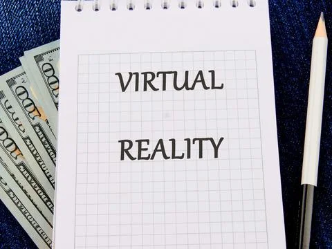 The concept of technology and development. Phrase, words, text VIRTUAL REAL.. Stock Photos