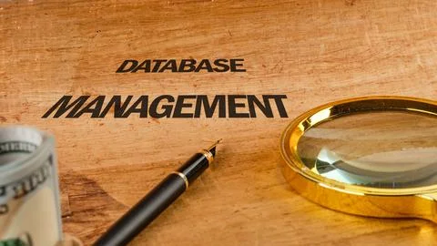 The concept of technology and development. Phrase, words, text DATABASE MANAG Stock Photos