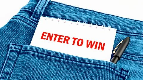 The concept of technology and development. Phrase, word, text ENTER TO WIN in Stock Photos