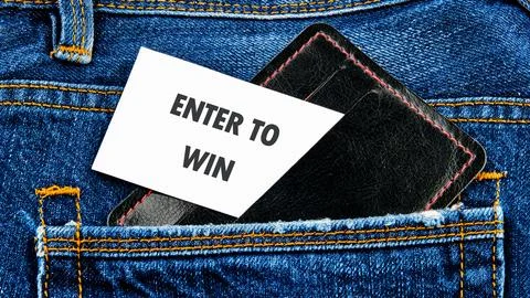 The concept of technology and development. Phrase, word, text ENTER TO WIN on Stock Photos