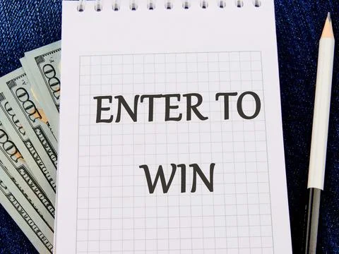 The concept of technology and development. Phrase, word, text ENTER TO WIN on Stock Photos