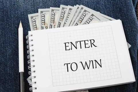 The concept of technology and development. Phrase, word, text ENTER TO WIN on Stock Photos
