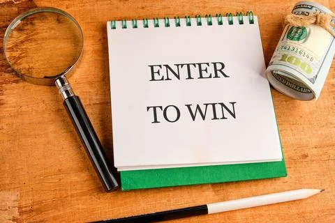 The concept of technology and development. Phrase, word, text ENTER TO WIN in Stock Photos