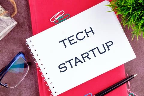 The concept of technology . The conceptual text of TECH STARTUP in a mini n.. Stock Photos