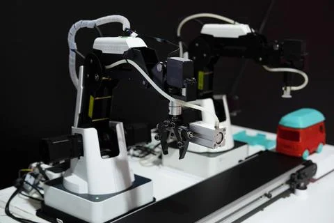 The concept of technology. Mini conveyor. An intelligent factory using modern Stock Photos