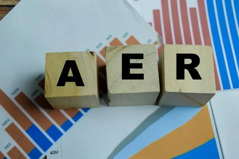 Concept of text AER - Annual Equivalent Rate finance on wooden blocks. Stock Photos