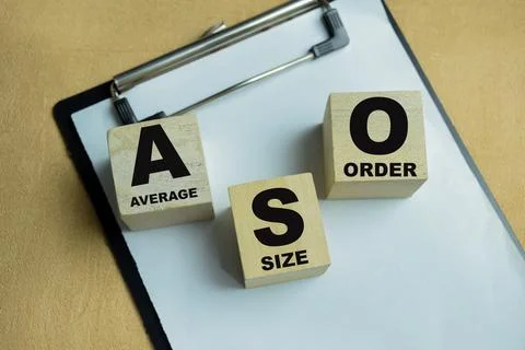 Concept of text AOS - Average Order Size on wooden blocks. Stock Photos