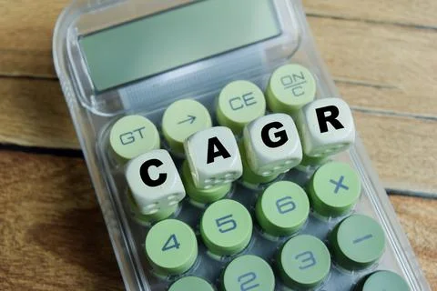 Concept of text CAGR - Compound Annual Growth Rate on wooden blocks. Stock Photos