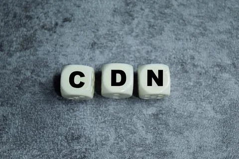 Concept of text CDN - Content Delivery Network on wooden blocks. Stock Photos