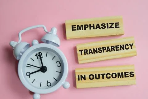 Concept of text emphasize transparency in outcomes on wooden blocks Stock Photos