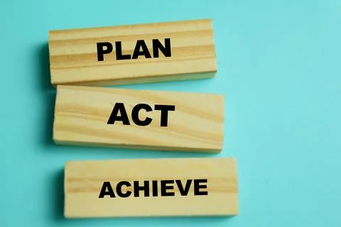 Concept of text plan act achieve on wooden blocks. For success, goal setting Stock Photos