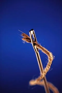 Concept, thread and needle Copyright: xVxMishra/DinodiaxPhotox  写真素材