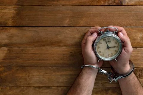 Concept time locked in jail for serving a crime. Stock Photos