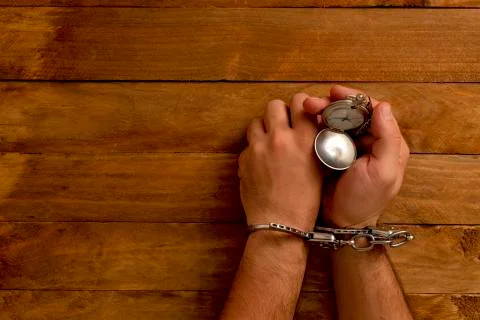 Concept time locked in jail for serving a crime. Stock Photos