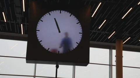 Concept time male drawing clock hands Stock Footage 98615591