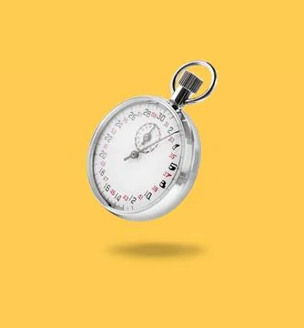 Concept of time. Vintage timer in air on light orange background Stock Photos