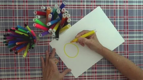 Concept. Timelapse. Hand drawing a sun, an arrow and a virus, with marker Stock Footage 130539034