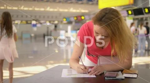 Concept of transportation of an unaccompanied child. A woman with two teenage Stock Photos