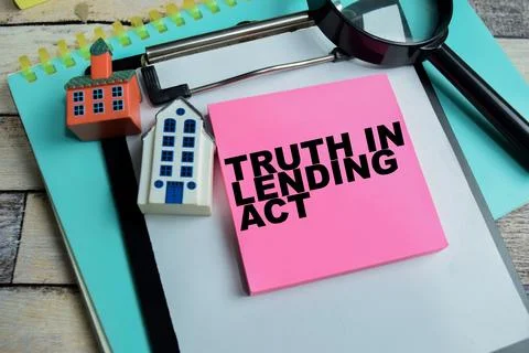 Concept of truth in lending act write on sticky notes isolated on Wooden Table Stock Photos