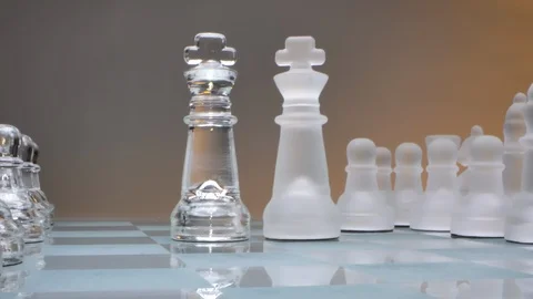The concept of two countries, glass chess, two kings stand against each other Stock Footage 126960579