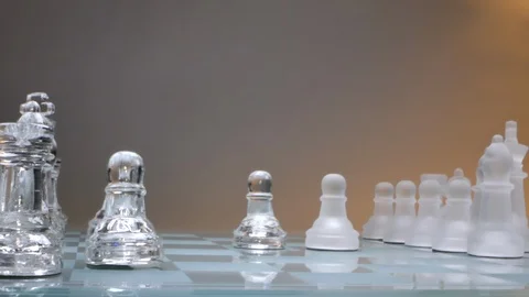 Concept two pawns stand opposite, glass chess, slow motion, very close shot Stock Footage 126960637