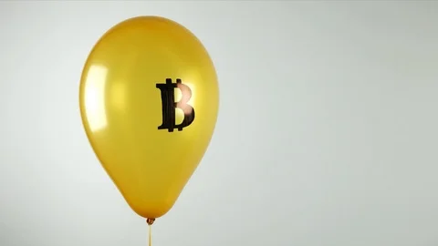 The concept of unreliability crypto currency. Yellow balloon with bitcoin logo. Stock Footage 85645809