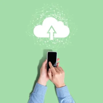 Concept of uploading data from phone to cloud service Stock Photos