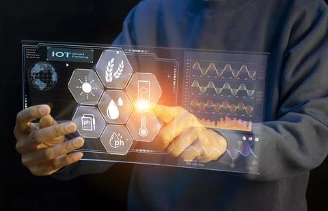 The concept of using AI and smart farming. Stock Photos