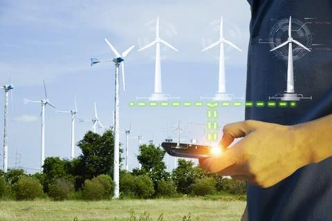 The concept of using clean energy such as wind power and production control. Stock Photos