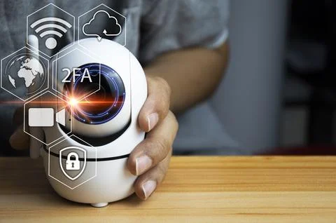 The concept of using IP cameras for security,White ip camera lies on wooden.. Stock Photos