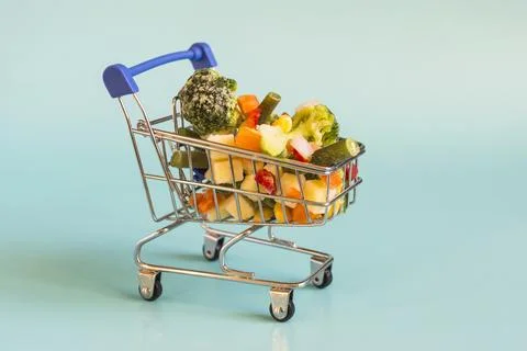 The concept of using quick-frozen vegetables. Stock Photos