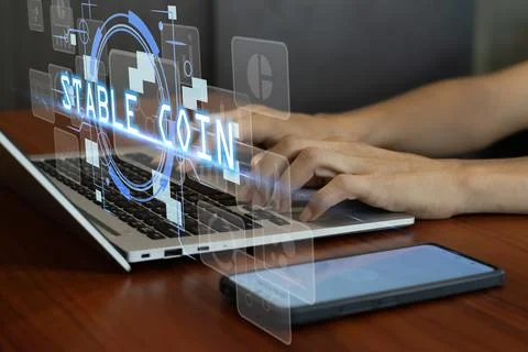 The concept of using stablecoins in the financial system. Stock Photos
