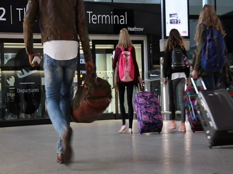 Concept vacations people walking modern airport terminal Stock Footage 78473026