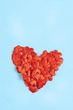 Concept of Valentine's Day, love. Red heart on a blue background Stock Photos