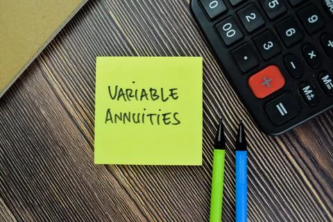 Concept of Variable Annuities write on sticky notes isolated on Wooden Table. Stock Photos