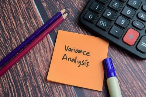 Concept of Variance Analysis write on sticky notes isolated on Wooden Table. Stock Photos