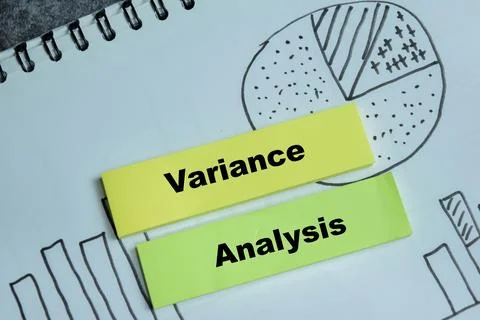 Concept of variance analysis write on sticky notes isolated on Wooden Table. Foto stock