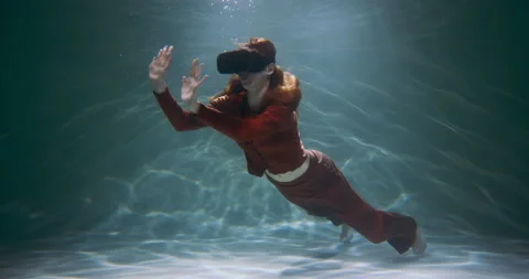 Concept of virtual reality. Beautiful young happy red haired woman using VR Stock Footage 153782877