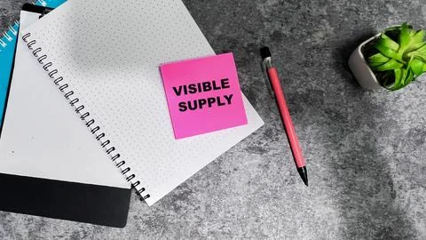 Concept of Visible Supply write on sticky notes isolated on Wooden Table. Stockfoto's