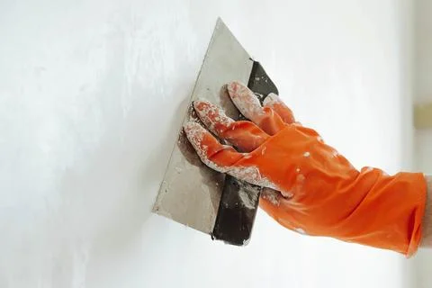 Concept of wall plastering, structural work, plaster work Stock Photos